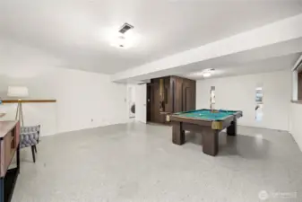 The expansive bonus room downstairs offers excellent versatility for a variety of uses