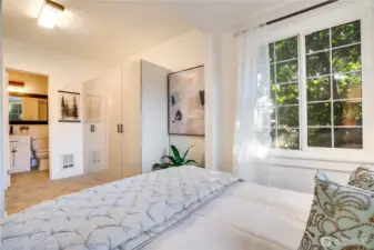 An attached three-quarter bath completes the primary suite.