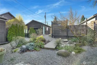 This private backyard oasis offers space to make it your own—whether you envision a pergola, hot tub, or play area.