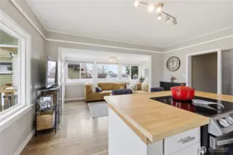 The kitchen and living room flow together.