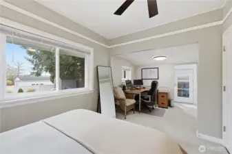 The 2nd bedroom extends into another room which is being used as an office.