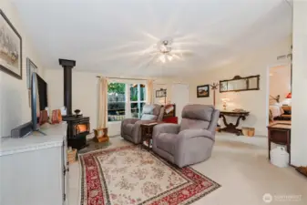 Energy efficient wood stove keeps the whole house toasty warm. Sellers have not turned on the furnace in 20 years.