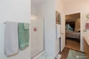 View of shower into Primary Bedroom.