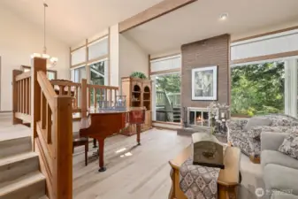 Vaulted ceilings allow for spacious feeling in living room and dining room.