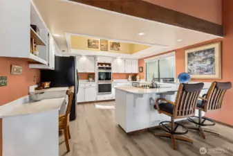 Large spacious kitchen has room for everyone to help at meal time.