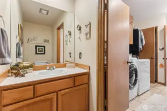 Half bath located through laundry room.