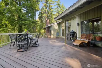 Large deck spans complete backside of home providing awesome entertaining space.
