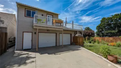 Pull through garage with 1 bed 1 bath apartment.
