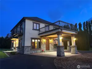 Twilight of portico with custom iron work