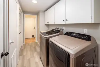 Whether drying ski gear or rotating guest linens, this full laundry and utility room makes extended stays a breeze. Located between the fourth bedroom and lower bath, it also provides seamless flow and added privacy for guests using the downstairs suite.