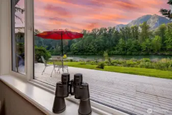 Welcome to River House Retreat—your front-row seat to Big Bend’s iconic Cable Hole on the Skykomish River. From this cedar-wrapped half-acre in Gold Bar, WA, watch eagles dive at dawn, mountains glow at dusk, and the rhythm of river life unfold just beyond your wraparound deck. Whether you’re savoring the view through binoculars or sharing stories over breakfast alfresco, this is where nature, nostalgia, and income potential converge—just an hour from Seattle.