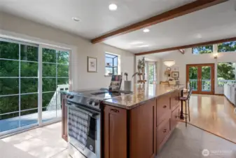 A stunning chef’s kitchen with an oversized island makes cooking a delight for anyone, combining style, functionality, and ample space for gathering.