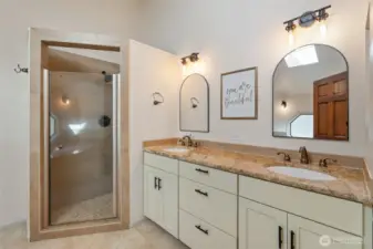 Elegant 5-piece ensuite bathroom connected to the primary suite, offering a perfect blend of convenience and luxury.