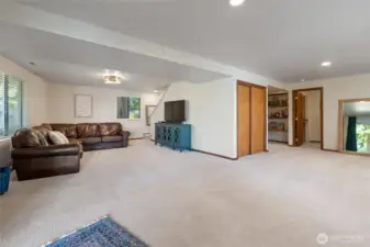 Featuring new carpet installed in 2025, abundant extra storage—including a secondary beverage refrigerator in the closet—and an abundance of natural daylight throughout.