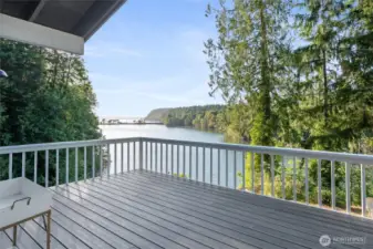 Imagine the fresh scent of pine and the peaceful sounds of wildlife from the comfort of this inviting deck.