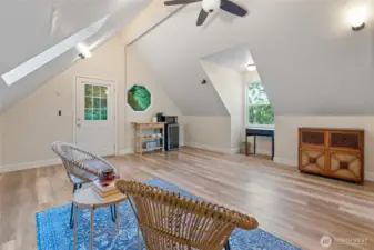 Thoughtfully designed with vaulted ceilings and filled with natural light, this space feels open and inspiring—perfect for an artist’s studio. Consider installing a composting or cinderella toilet, and bring in water for effeciency.