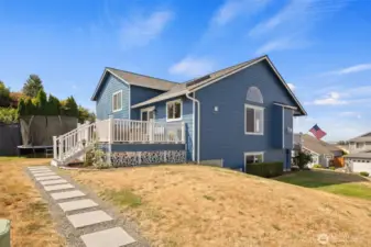 The back and side yard are spacious and offer ample opportunity for outdoor enjoyment.