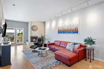 The living room is spacious and comfortable, beckoning you to views of the Tacoma Narrows.