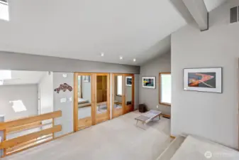This open space is your "dressing area" with access to the large walk-in closet, which has two distinct sides.