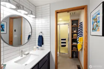 Guests have access to this updated 3/4 bath.