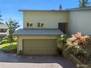 The condo units are divided in a way that each has its own garden space. This end unit, in particular, is open to your personal touch...or not!