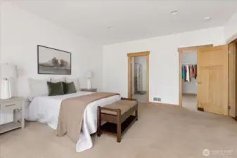 Primary Suite features two walk-in closets and a full en-suite bathroom.