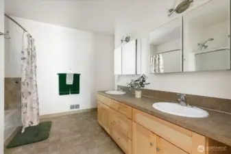 Large en-suite features two sinks, a huge tub, and a full separate shower. Plus plenty of room to spread out.