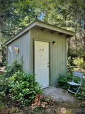 Two-Party Well house, shared with neighboring lot to north. (photo taken in spring)