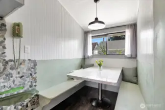 Built in banquet is a great place to gather for meals.