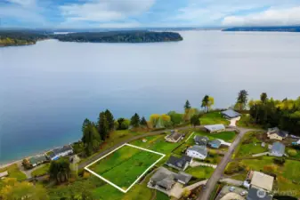 Aerial View of lot and community looking out over the sound and Anderson Island.
