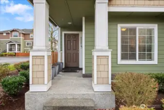 Welcoming front porch entry with clean architectural details