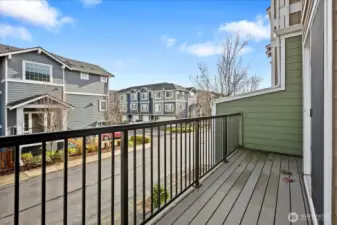 Second-level balcony overlooking the surrounding townhome community