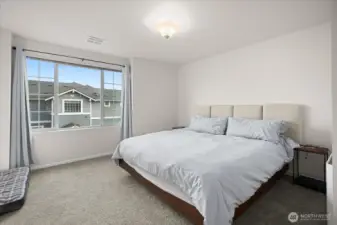 Large window that invites soft, natural light into the room