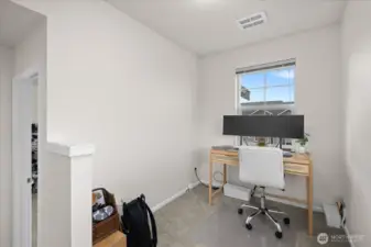 Versatile loft ideal for a home office, study area, or creative nook
