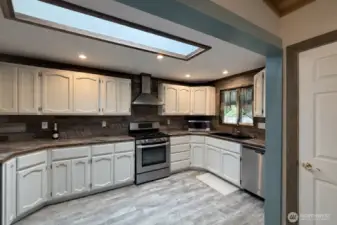 Spacious kitchen with updated appliance. Perfect for entertaining.