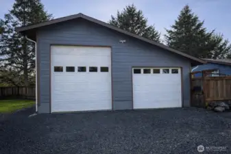 1000 sq ft shop with power. Right beside it is a place to park your RV or boat with power.