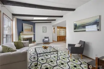 Living room towards dining room and primary bedroom..