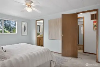 A view to the hallway and to the ensuite bathroom.