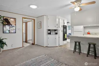 You can sit at the kitchen counter to chat or eat.