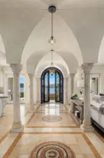 Arched concourse divides kitchen and living areas