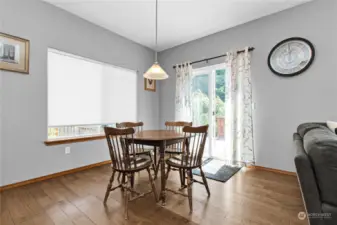 Kitchen eating area, out the slider to huge deck for entertaining.