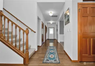 Front door as you walk down the hall into the home.