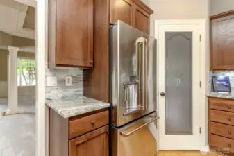 New Cafe Elite fridge with HOT WATER dispenser next to lighted walk-in pantry.