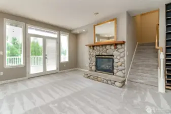 This Norris resale features brand new wall-to-wall carpet and beautifully wood-wrapped windows with matching wood blinds throughout, the ENTIRE HOME. Cozy up around the charming river rock fireplace, and don’t miss the private second staircase—an exceptional touch of character and convenience!