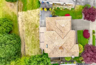 The Presidential-grade cedar roof has been meticulously maintained and professionally treated, reflecting pride of ownership and long-term durability.