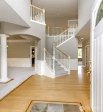 Formal entry with real hard woods and formal staircase. NEW CARPET throughout the entire house!
