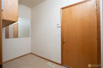 Laundry Room/Pantry. Entrance to garage