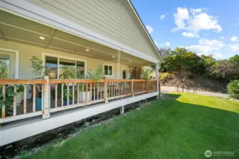 Gorgeous back deck overlooking Three Lakes Golf Course