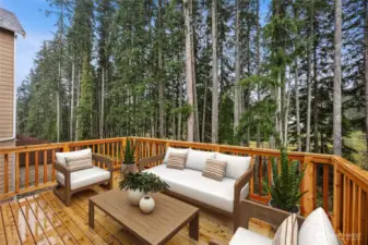 Enjoy main floor private deck and covered patio. Photo's are for representational purposes only. Colors and finishes may differ.