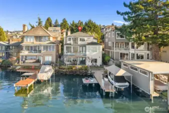 Experience the ultimate Lake Washington lifestyle at this west-facing retreat on a uniquely quiet part of the lake that feels like a private waterfront playground.